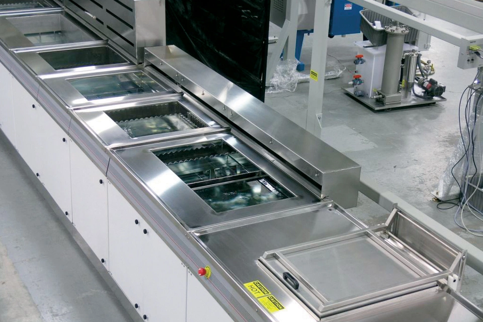 Rinse/passivation/dry stations
